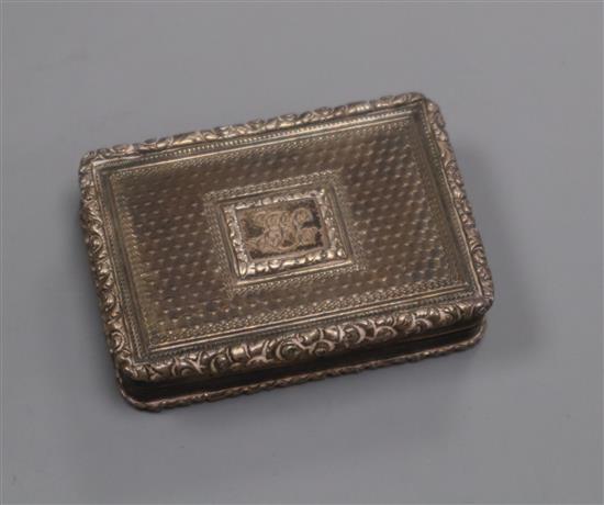 A William IV silver vinaigrette, with pierced gilt grille, engraved with a lyre, Edward Edwards II, London, 1834, 44mm.